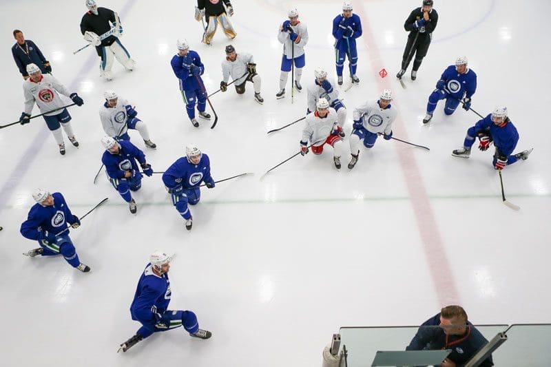 Derek Popke coaching Vancouver Hockey School's NHL Pro Camp at the University of British Columbia